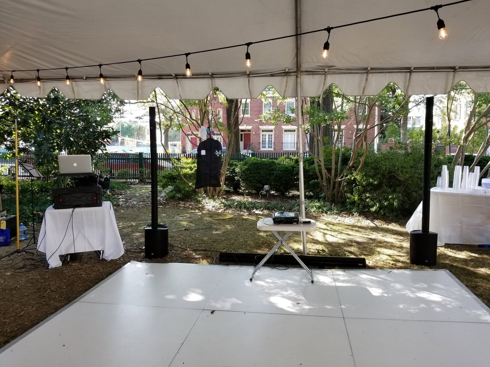 Priya and Daniel's wedding, photo 3 — tented dance floor under string lights